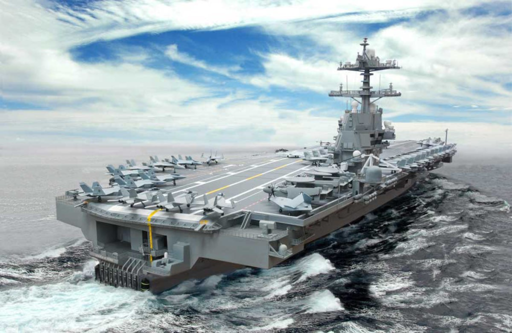 porta-aviões classe Ford navegando com caças no convés, maior navio militar do mundo